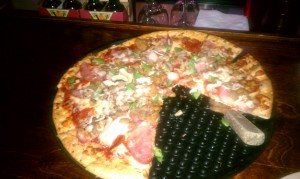 Photo of Carnivore Pizza at Rockin' Tomato in Austin, TX